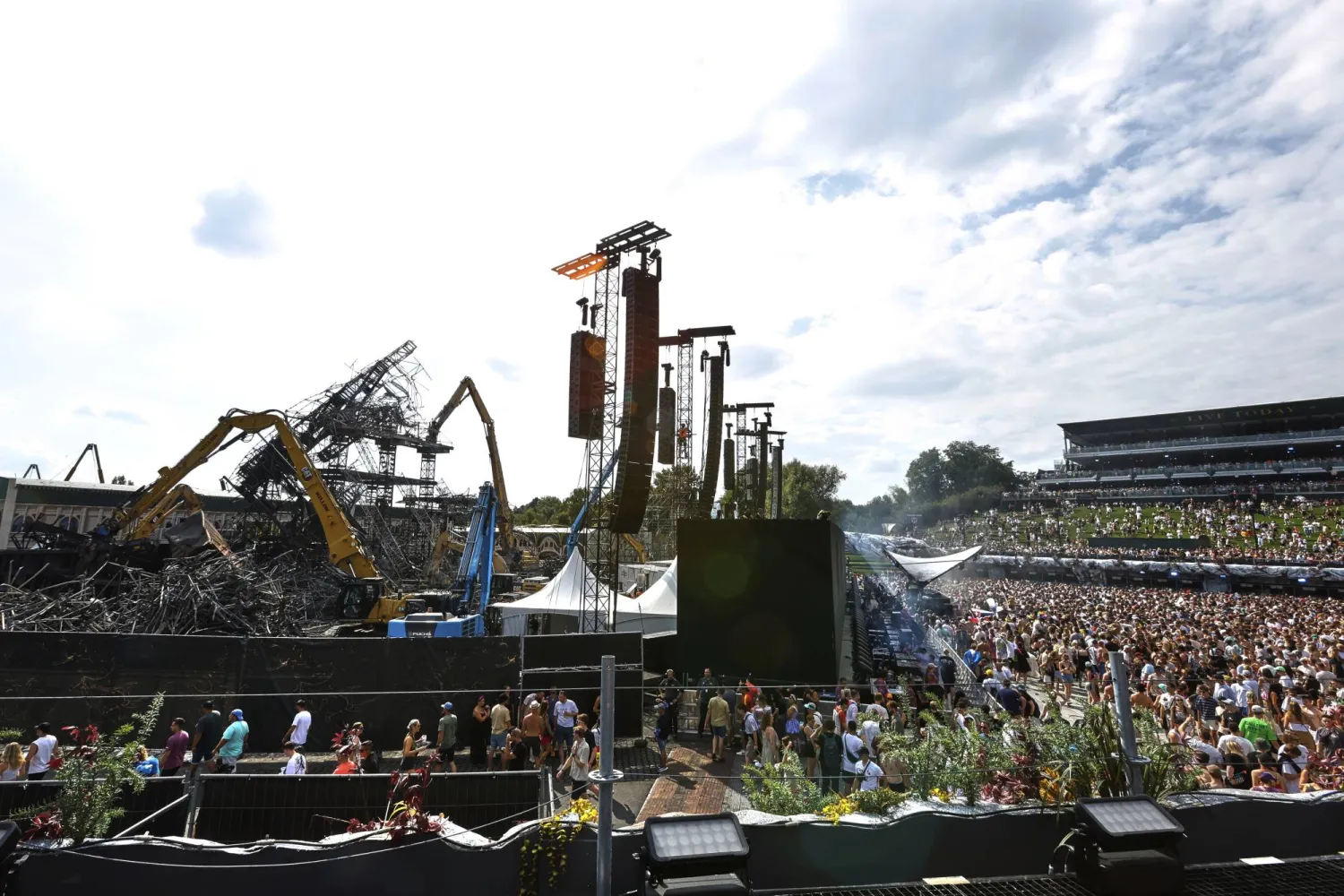 The burned main stage is seen at the Tomorrowland music festival in Boom, Belgium, Friday, July 18, 2025, two days after a huge fire destroyed the stage on Wednesday. (AP Photo/Omar Havana)